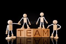 teamwork-concept-wood-cube-block-word-team-wooden-stick-figures-team-teamwork-concept-wood-cub...jpg