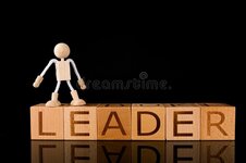 wood-cube-block-word-leader-wooden-stick-figure-standing-black-background-success-concept-1315...jpg