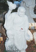 statue with fall leaf.jpg